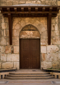 Man Reading Near An Old Door, Damascus, Damascus Governorate, Syria