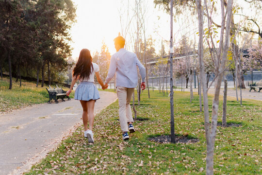 Couple Run Hand In Hand