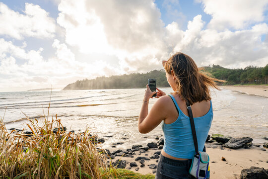 tourist taking photo on cellphone 