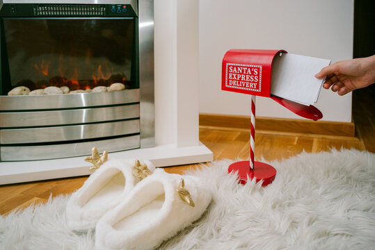 Children Send Letters to Santa From Mailbox in Living Room