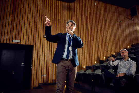 Manager speaks at the conference