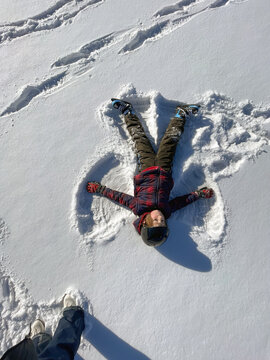 Child Making a Snow Angel