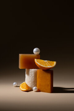 Elegant still life composition with orange slices, soap, and pearls