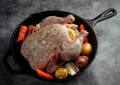 Chicken and Veggies Ready in a Cast Iron Skillet