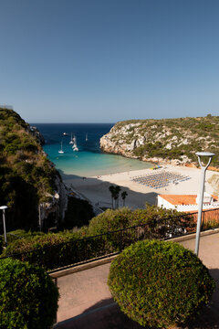 Cala en porter cove with boats and beach