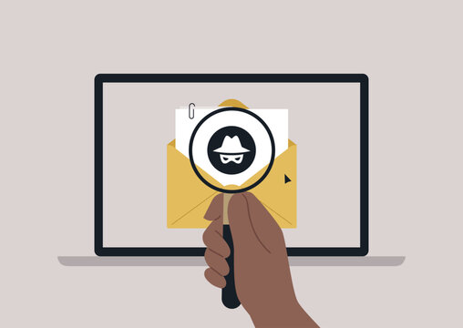 A hand grasps a magnifying glass, focusing on a digital envelope showcased on a laptop screen, representing the alarming rise of ransomware threats in today's technology landscape.