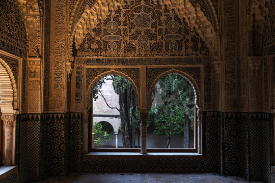 Arched windows of the Alhambra with landscape view