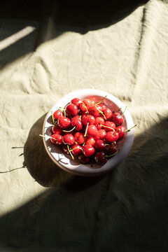 Fresh Cherries in White Bowl
