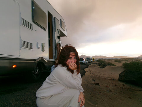 Woman by Camper Van
