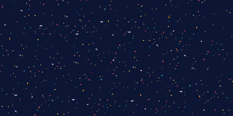 Festive confetti background with small sprayed colourful particles. Irregular vector spots and dots texture