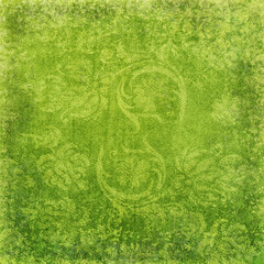 Green grunge textured background with soft ornamental patterns. Natural earthy look perfect for eco designs, backgrounds, vintage projects, and abstract art.