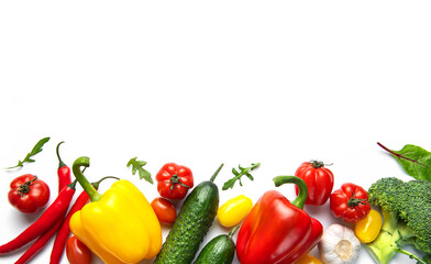 Fresh organic vegetables forming healthy food border