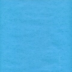 Blue embossed floral paper texture with subtle leaf and flower patterns. Clean decorative background ideal for stationery, invitations, and elegant design layouts.