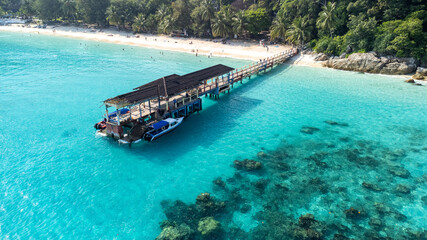 Aerial View of Tropical Beach and Wooden Pier in Perhentian Islands © Margalliver