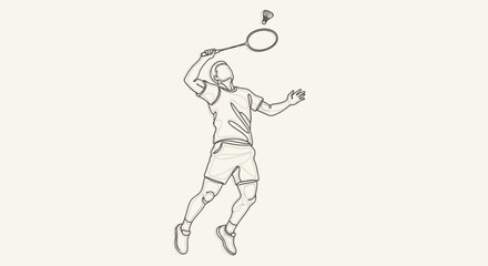 Obraz premium Male badminton player hitting a shuttlecock with a powerful swing in a bright studio setting.
