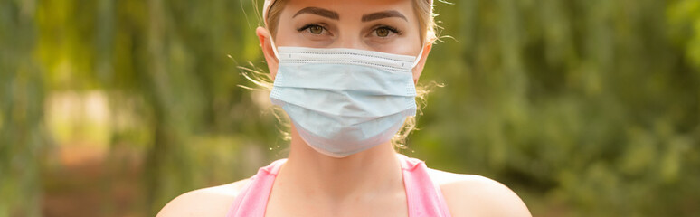 Close Up Of Woman Wearing Medical Face Mask