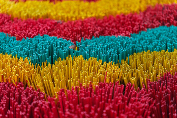 Colorful bamboo incense sticks drying in Thuy Xuan traditional craft village Hue Vietnam