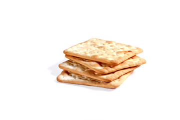 Wheet crackers isolated on white background, shallow focus