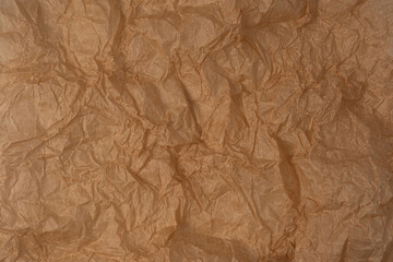 Fototapeta premium Crumpled paper as background. Top view.