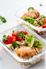 Healthy meal prep with chicken, quinoa, and vegetables for lunch or dinner in clear containers
