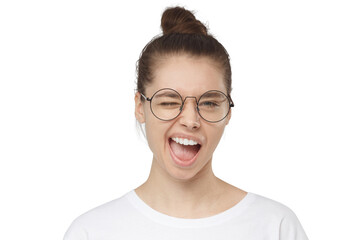 Fototapeta premium Woman laughing and winking in white t-shirt with round glasses