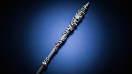 Ornate Silver Wand on Dark Background.