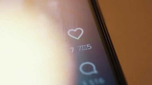 Abstract timelapse of social media feed with rapidly changing photos, likes and comments icons. Numbers constantly updating. Viral content, engagement, information overload and digital lifestyle