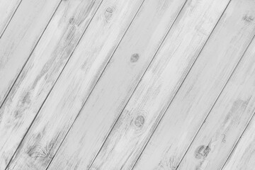 Obraz premium White colored painted wooden board with visible grain and diagonal planks, wall wooden surface. Rustic wood texture background, design element, wallpaper, backdrop