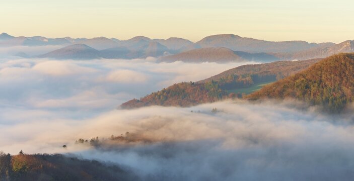 View from the Gisliflue of the Jura foothills covered in fog in morning light, Talheim, Canton, Aargau, Switzerland