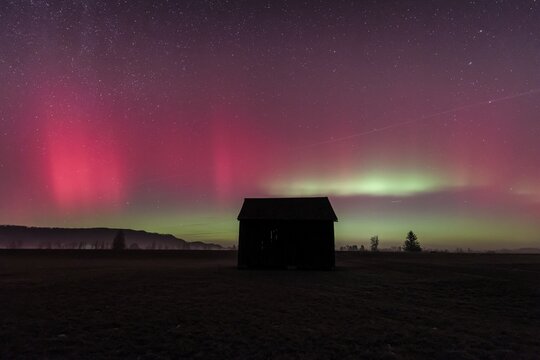 Northern lights, aurora borealis, solar storm, January 2026, red, green, hut, Loisach-Lake Kochel-Moore, Alpine foothills, Bavaria, Germany