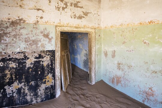 At Kolmanskop, the abandoned ghost town of the diamond days of the early 1900 and of German origin. Inside the restricted Diamond Area east of the coastal town of L&uuml;deritz. Namib Desert, Namibia