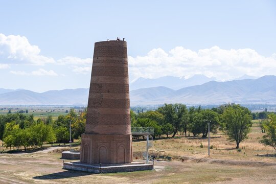 Burana Tower, remains of Karakhanid Minaret, histroic ancient city of Balasagun on the Silk Road, Balbals, historic tombstones in the shape of human faces, near Tokmok, Chuy, Kyrgyzstan