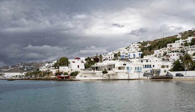 Cycladic white houses and Greek Orthodox white church with red roof, Holy Church of Rodon and Amaranto, Old Port of Mykonos, Chora, Mykonos Town, Mykonos, Cyclades, Aegean Sea, Greece