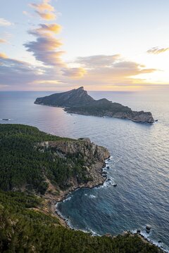 View of mountains and coast with sea, at sunset, walking to La Trapa from Sant Elm, back island of Sa Dragonera, Serra de Tramuntana, Majorca, Spain