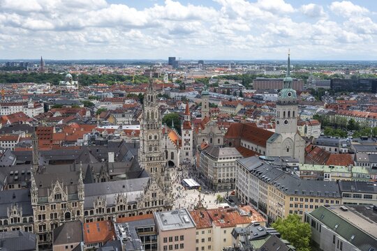 View over Munich, Marienplatz with Old and New Town Hall, Holy Spirit Church and St. Peters Church, Munich, Bavaria, Germany