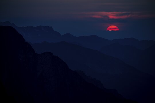 Fiery sunball at sunset with Lechtaler Alps, Reutte, Lechtal, Au&szlig;erfern, Tyrol, Austria