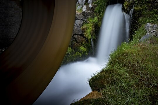 Turning water wheel with small stream, Wildhaus, Appenzell, Switzerland
