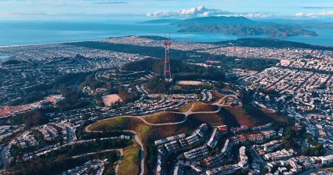 Green low-rise cityscape with radio tower in the middle. Residential area of San Francisco, California, USA from drone.