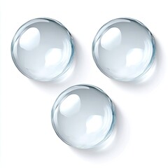 Three realistic, round, clear spheres, casting shadows on a white background