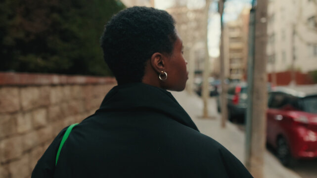 Urban Street Portrait Of A Person Walking Alone