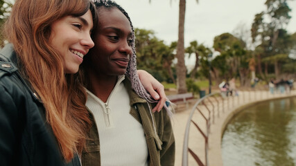 Naklejka premium Happy Lesbian Couple Smiling Together In Park