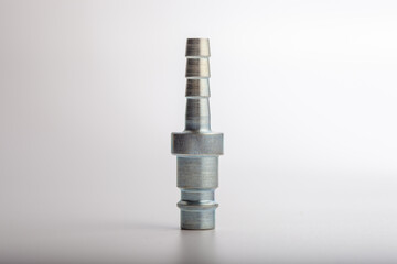 Steel pneumatic hose barb plug for quick connect air coupling systems, industrial metallic nipple connector for hydraulic tools and pressure equipment isolated on white background for designers