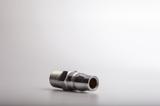 Chrome-plated steel quick release air coupler with male NPT thread for pneumatic tool connections, air compressor systems, and industrial workshop equipment applications on white background