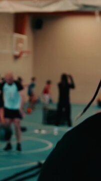 Fit Male Leads Fitness Class in Gym