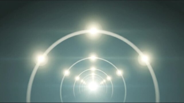 A long tunnel with arching white lines receding into the distance, with bright lights at the end