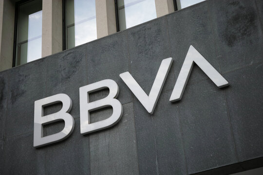 BBVA bank logo on a dark stone wall