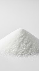 Fototapeta premium Essential white superfine granulated sugar ingredient captured in a pile, crucial for creating light and fluffy sponge cake batter, macro, delicious, close-up