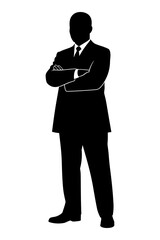 Silhouette of a confident businessman standing with arms crossed resolutely
