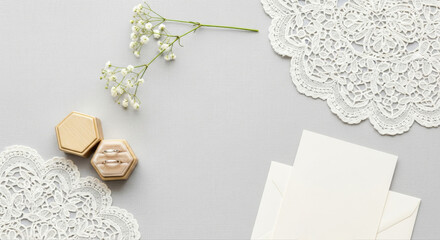 Elegant Wedding Stationery Flat Lay with Lace and Floral Accents