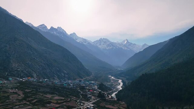 Scenic Aerial of Baspa River Valley with Snow Capped Himalayan Peaks